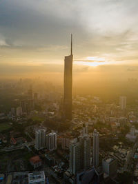 High angle view of cityscape against sky during sunset