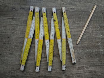 High angle view of yellow and knife on table
