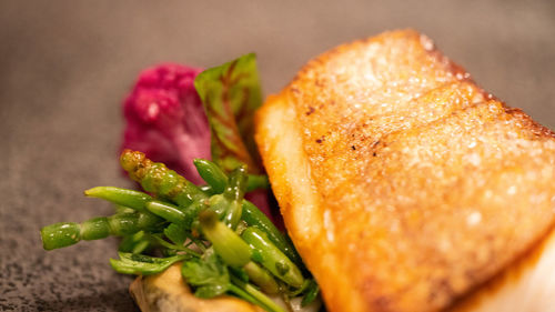 Close-up of burger in plate on table