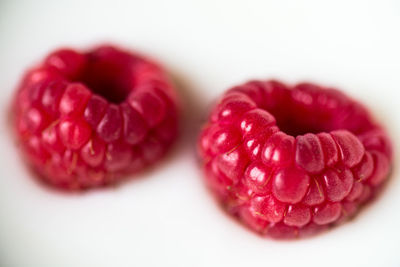 Close-up of strawberry over white background