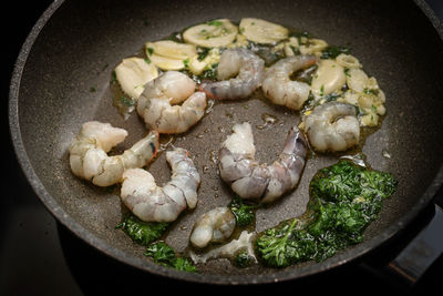 High angle view of meat in cooking pan