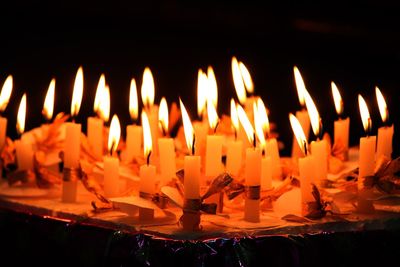 Close-up of illuminated candles