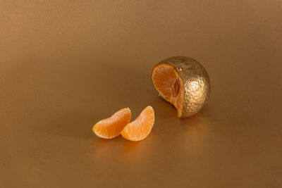 Close-up of fruit against white background