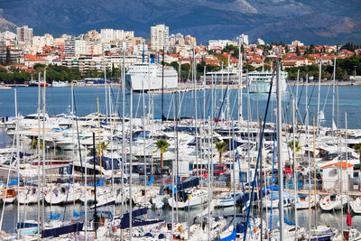 High angle view of boats moored in harbor