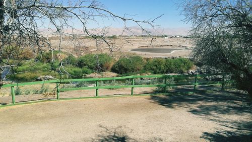 Scenic view of park against clear sky