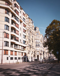 Buildings in city against sky