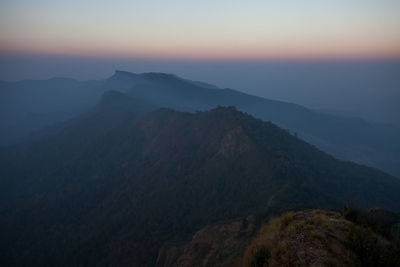 Scenic view of mountains against sky during sunset