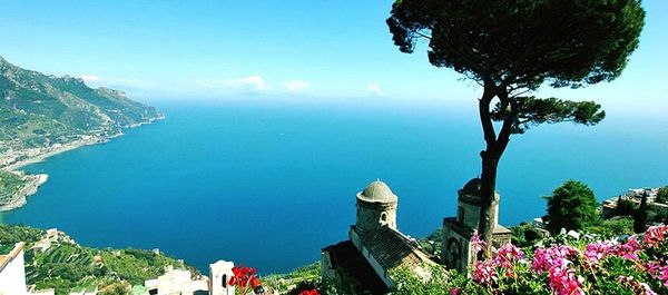 Scenic view of calm sea against blue sky