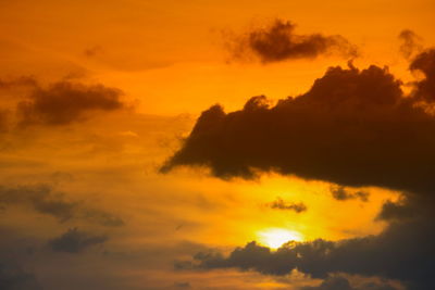 Low angle view of dramatic sky during sunset