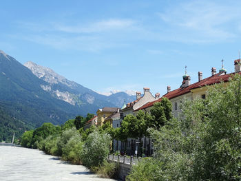 Houses and buildings against sky