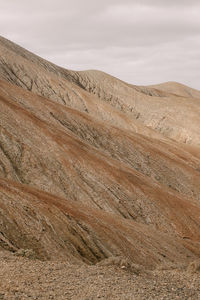 Textured fragment of the volcanic hill, brown color, landscape of fuerteventura island