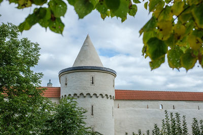 Medieval city wall with round tower