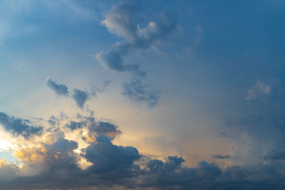 Low angle view of clouds in sky during sunset