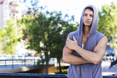 Portrait of man standing outdoors