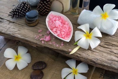 Close-up of frangipani on table