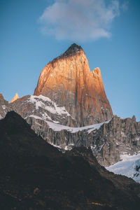 Scenic view of snowcapped mountain against sky