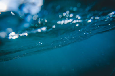 Close-up of water drops on swimming pool