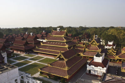 High angle view of buildings against clear sky