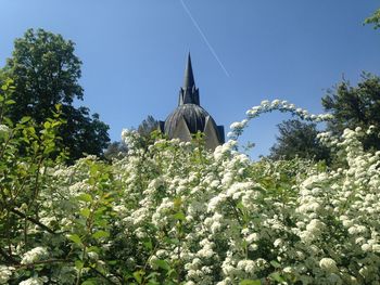 Low angle view of built structure against blue sky