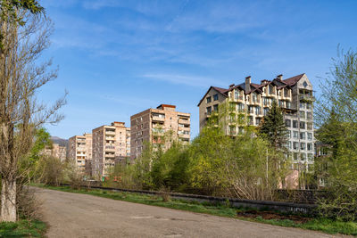 Buildings in city against sky