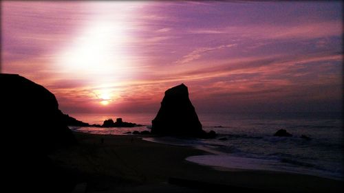 Scenic view of sea at sunset