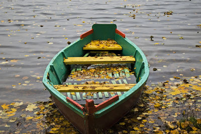 High angle view of boat moored on lake