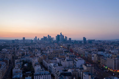 High angle view of buildings against sky during sunset