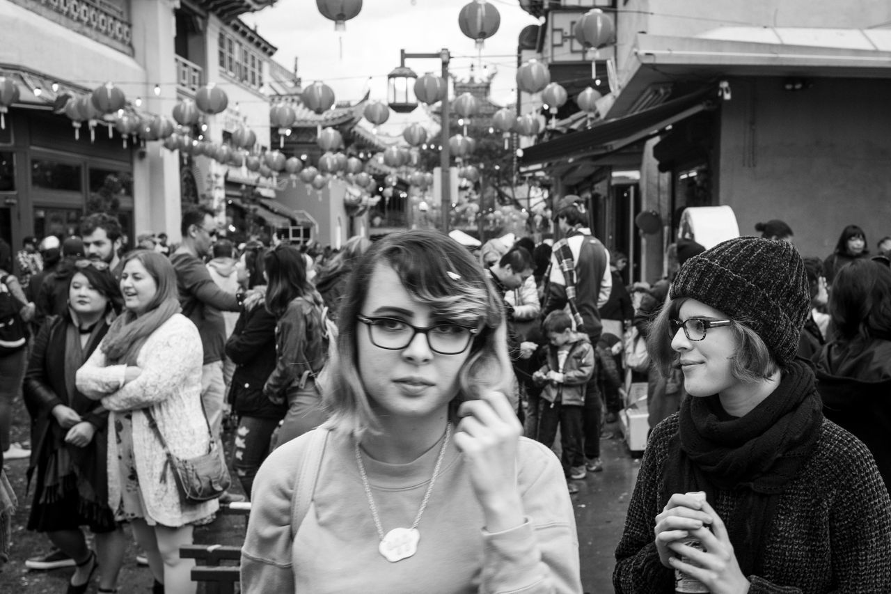 real people, group of people, women, people, crowd, incidental people, architecture, lifestyles, adult, leisure activity, retail, men, portrait, young women, market, store, young adult, standing, retail display, hairstyle