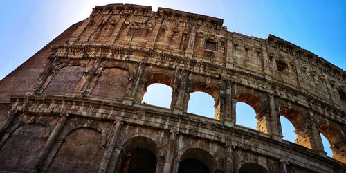 Detail of the colosseum in rome, italy, from a low angle view