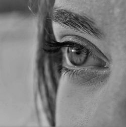 Cropped image of woman looking away