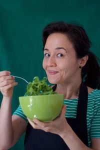 Portrait of woman eating food