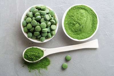 High angle view of green fruits in bowl on table