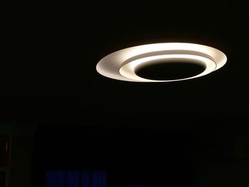 Low angle view of illuminated lamp