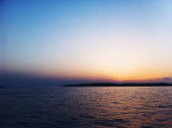 Scenic view of sea at sunset