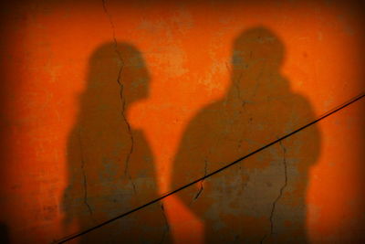 Shadow of man on wall