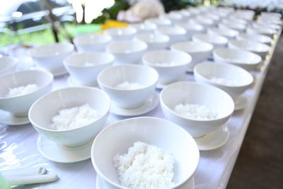 Close-up of white served on table