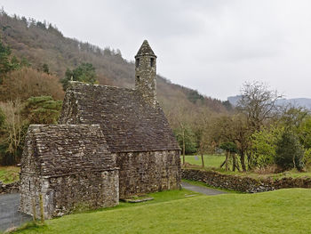 Old ruin building on field