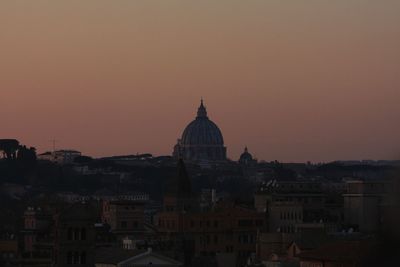 View of townscape against sky during sunset