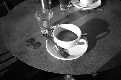 High angle view of coffee cup on table