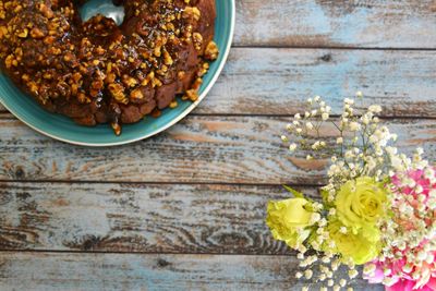 Close-up of flowers in plate on table