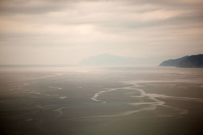 Scenic view of sea during foggy weather