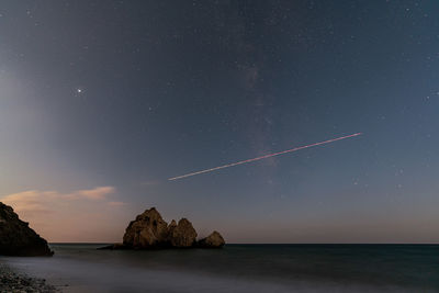 Astrophotography with a plane passing by