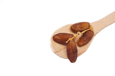 High angle view of cake against white background