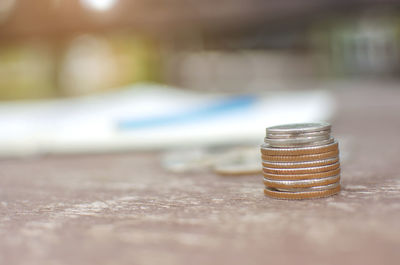 Close-up of coins on table