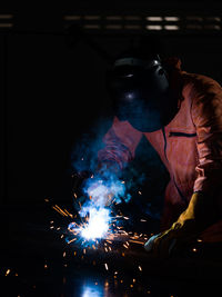 Welder working in industry