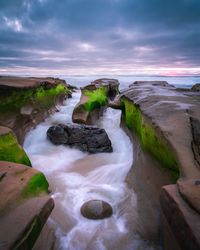 Scenic view of sea against sky during sunset