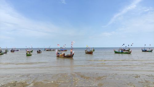 Asian fisherman boat at shores in indonesia