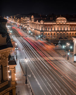 High angle view of light trails on road at night