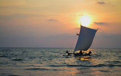 Scenic view of sea at sunset