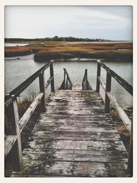 Wooden pier in sea